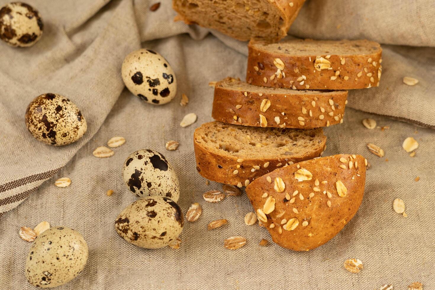 Quail eggs fresh natural and baguette cereal lean close-up photo
