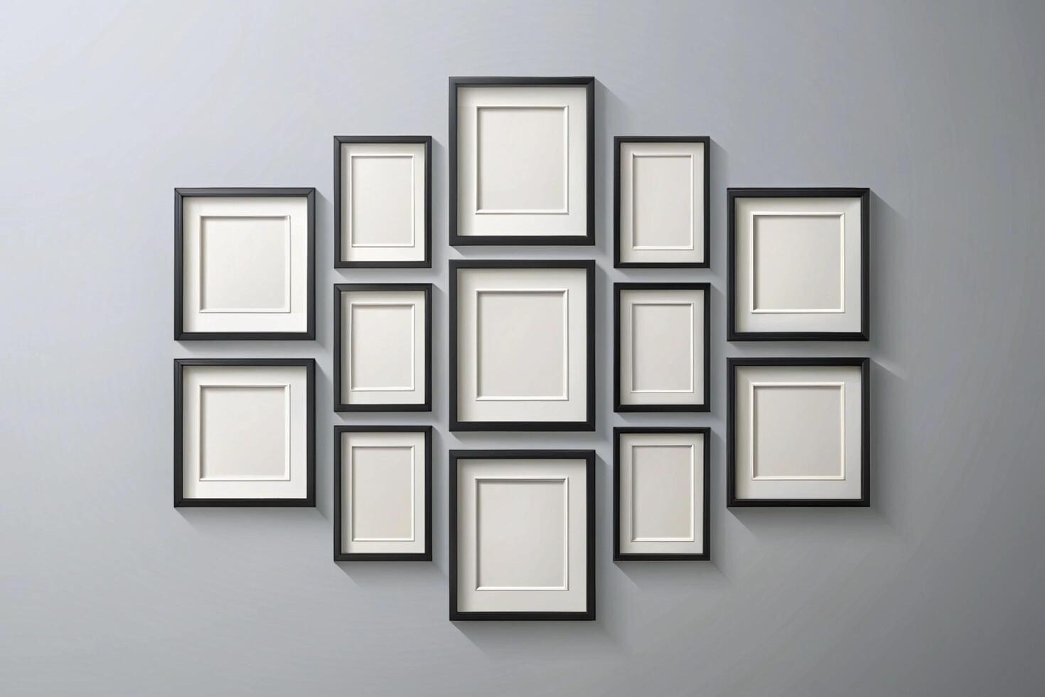 Contemporary empty photo frames in sleek black and gold on neutral wall, offering customizable display for stylish interior decoration