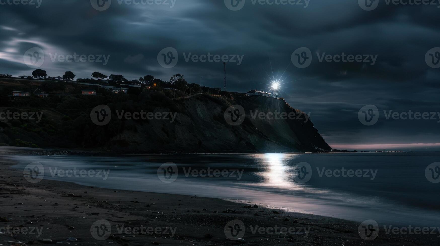 Long exposure of the beach at night in San Sebastian, Spain. photo