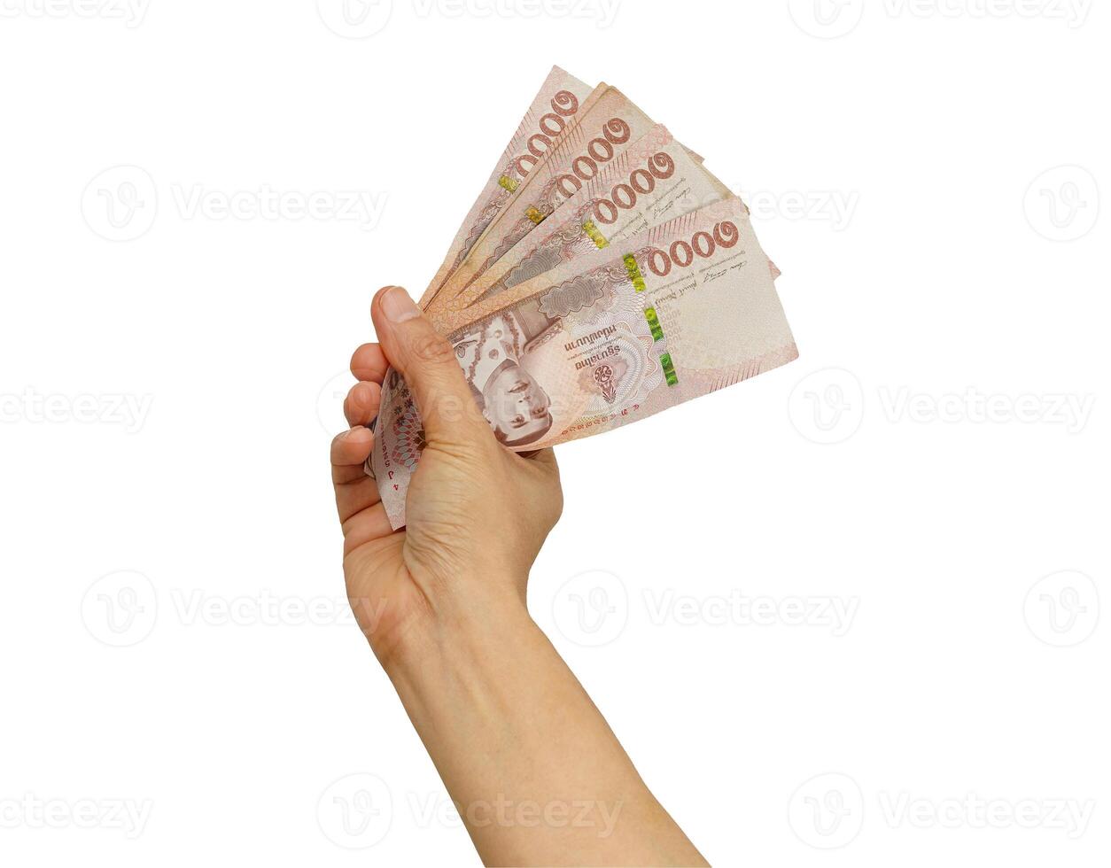 Asian woman counting Thai baht banknote money and holding in hand isolated on white background. photo