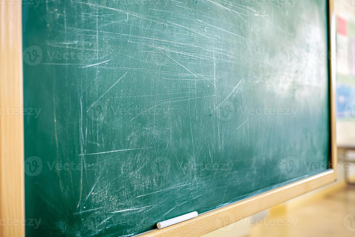 Green chalkboard in great condition, ready for lessons in an educational space. photo