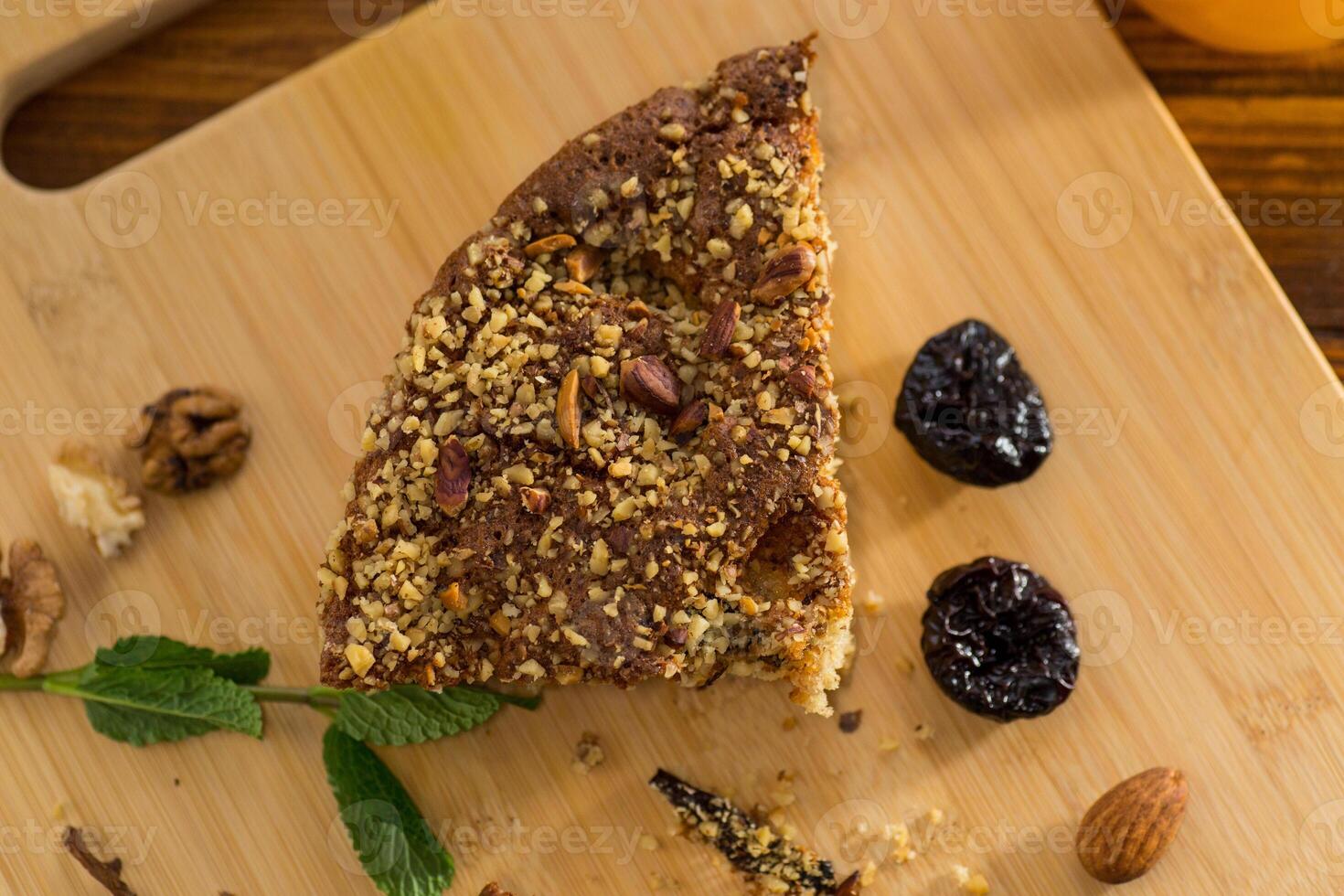Natural products,Homemade sponge cake with nuts and prunes photo
