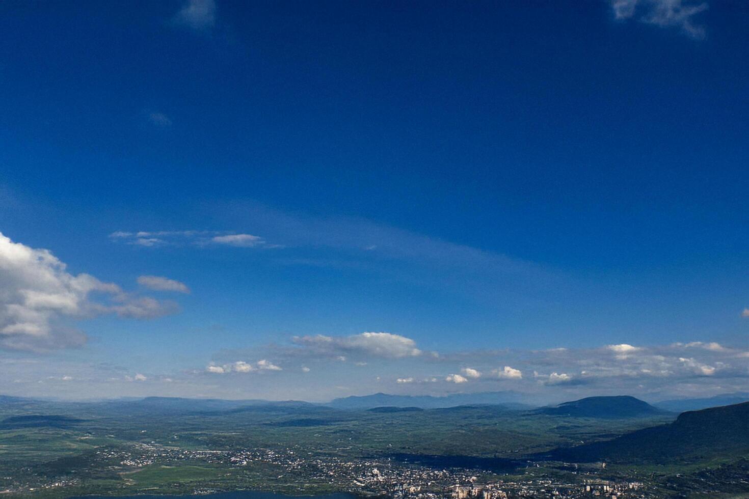 Mountaintop view City, valley, clear sky, summer photo
