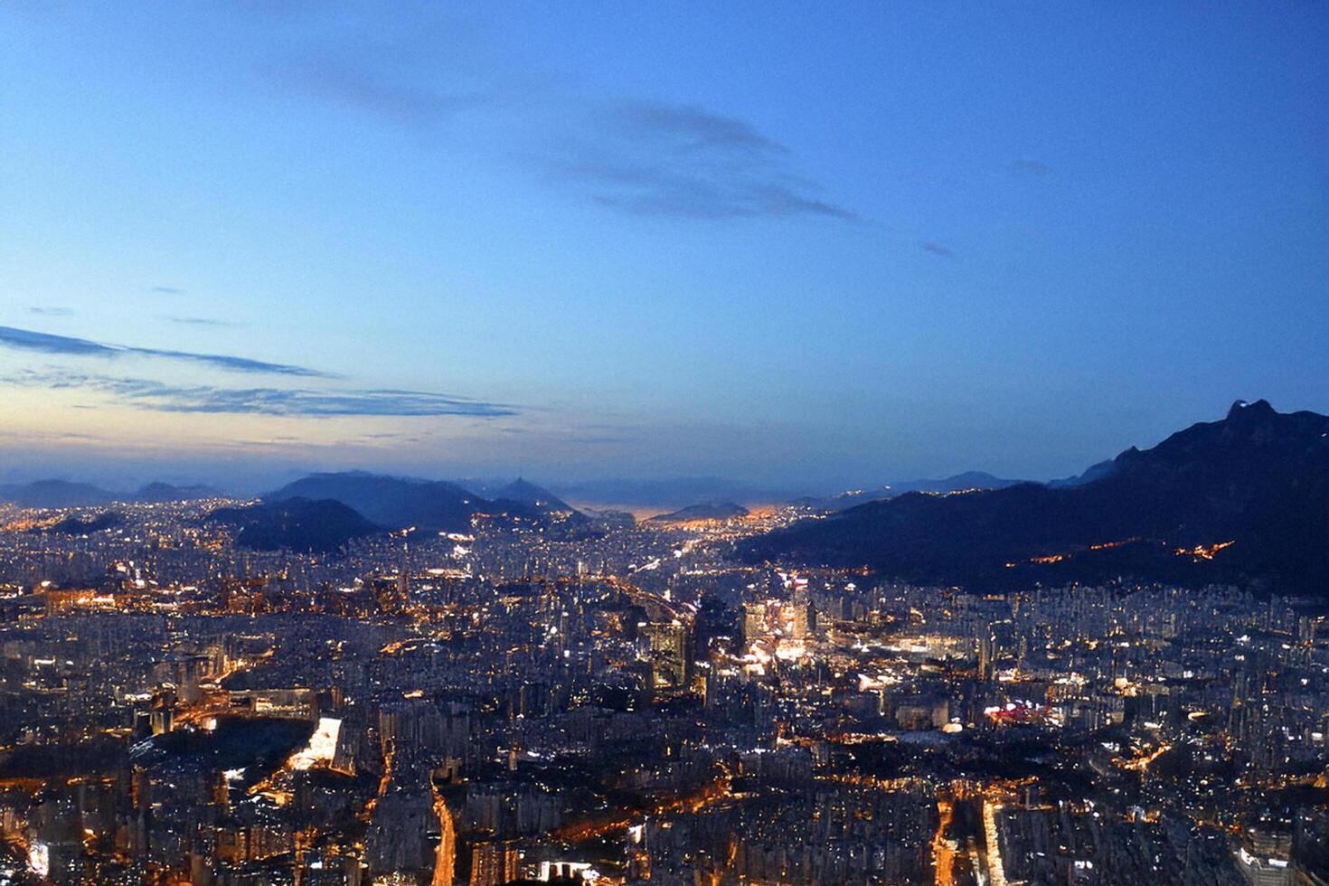 Cityscape twilight view from mountaintop photo