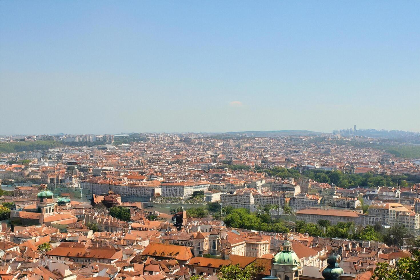 Cityscape panoramic view, summer day, hilltop, distant mountains photo