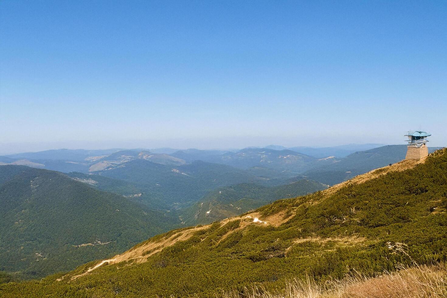 Mountaintop observation tower scenic view photo