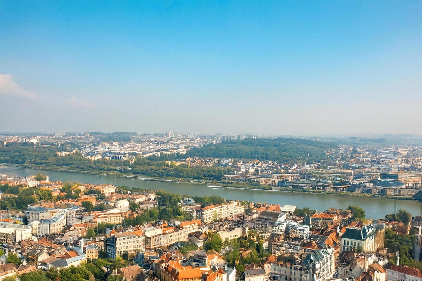 Cityscape aerial view river, buildings, summer, haze, travel photo