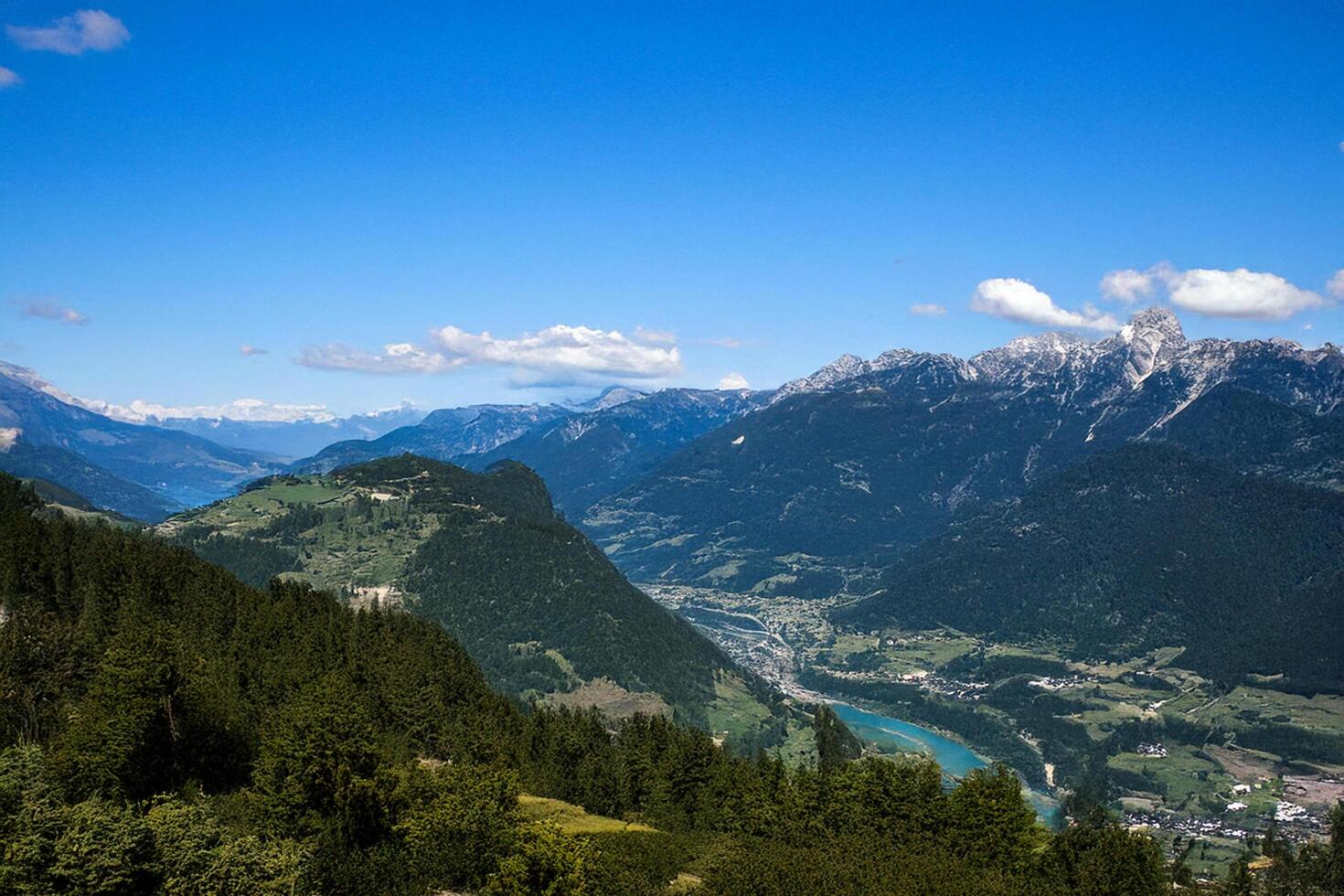 Mountain valley summer vista, lake, clear sky, travel brochure photo