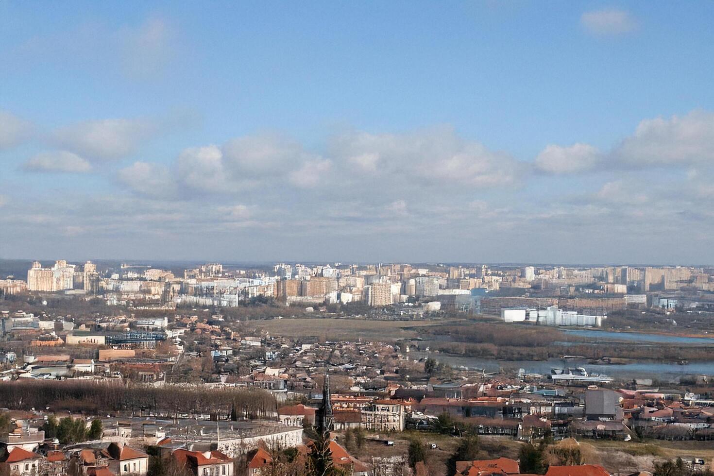 Cityscape panorama, aerial view, sunny day, river, suburbs, urban planning photo