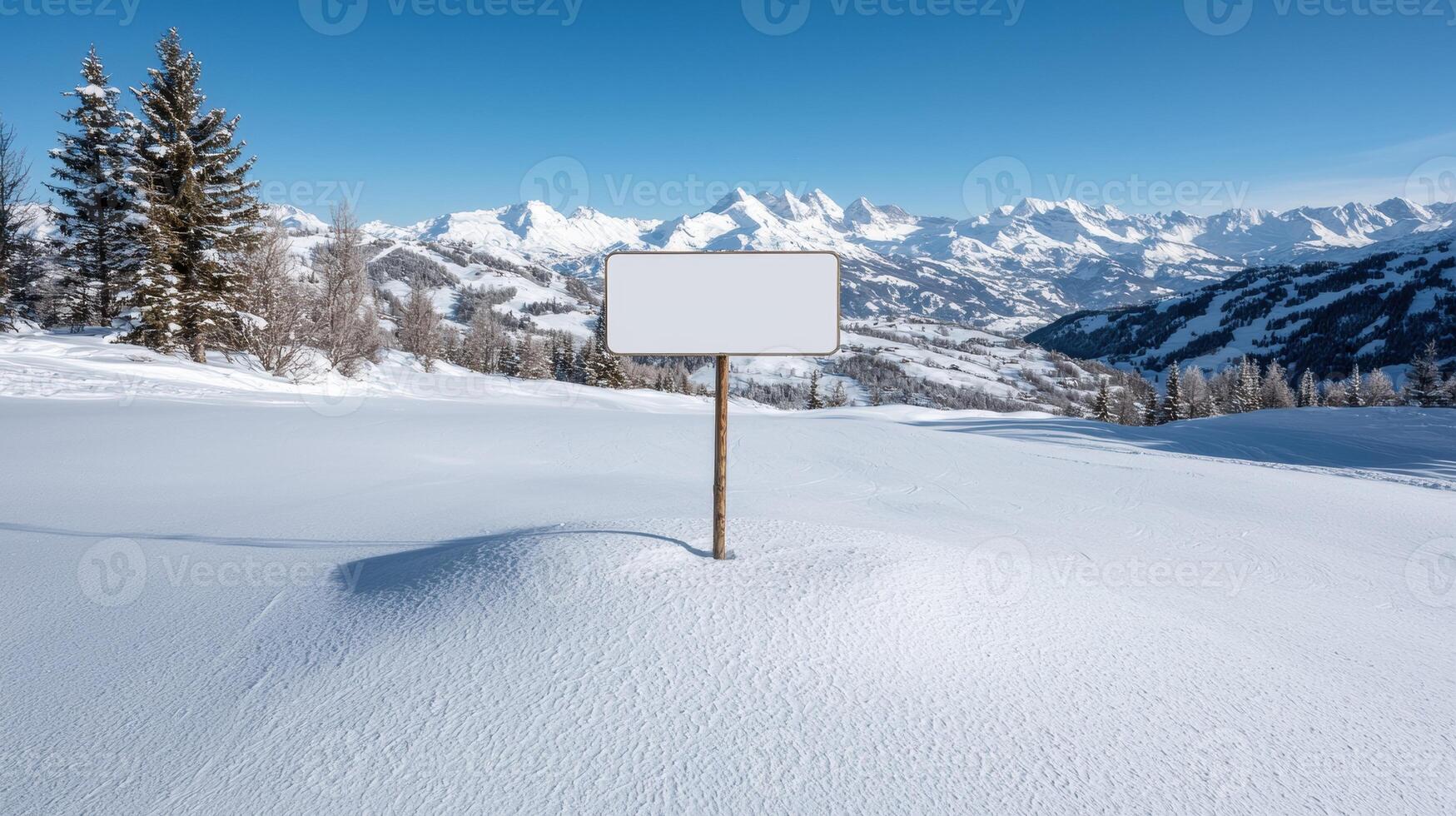 Blank sign in snowy mountains winter landscape photo