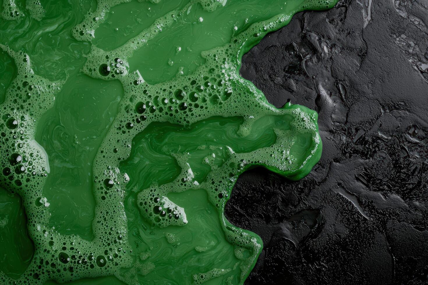 Abstract green slime with bubbles on black background photo