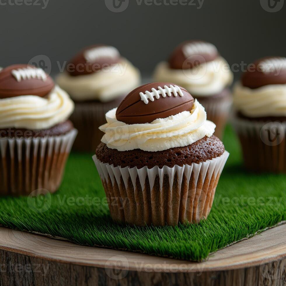 Chocolate cupcakes decorated with footballs for game day photo