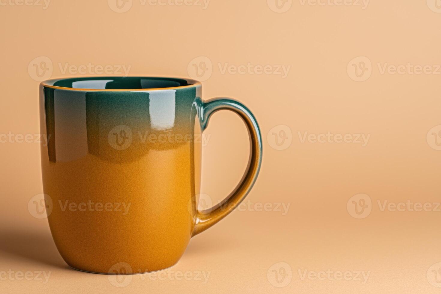 Two toned ombre mug on beige background photo