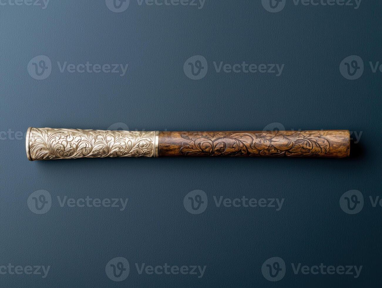 Antique silver and wood cigarette holder with intricate carvings photo