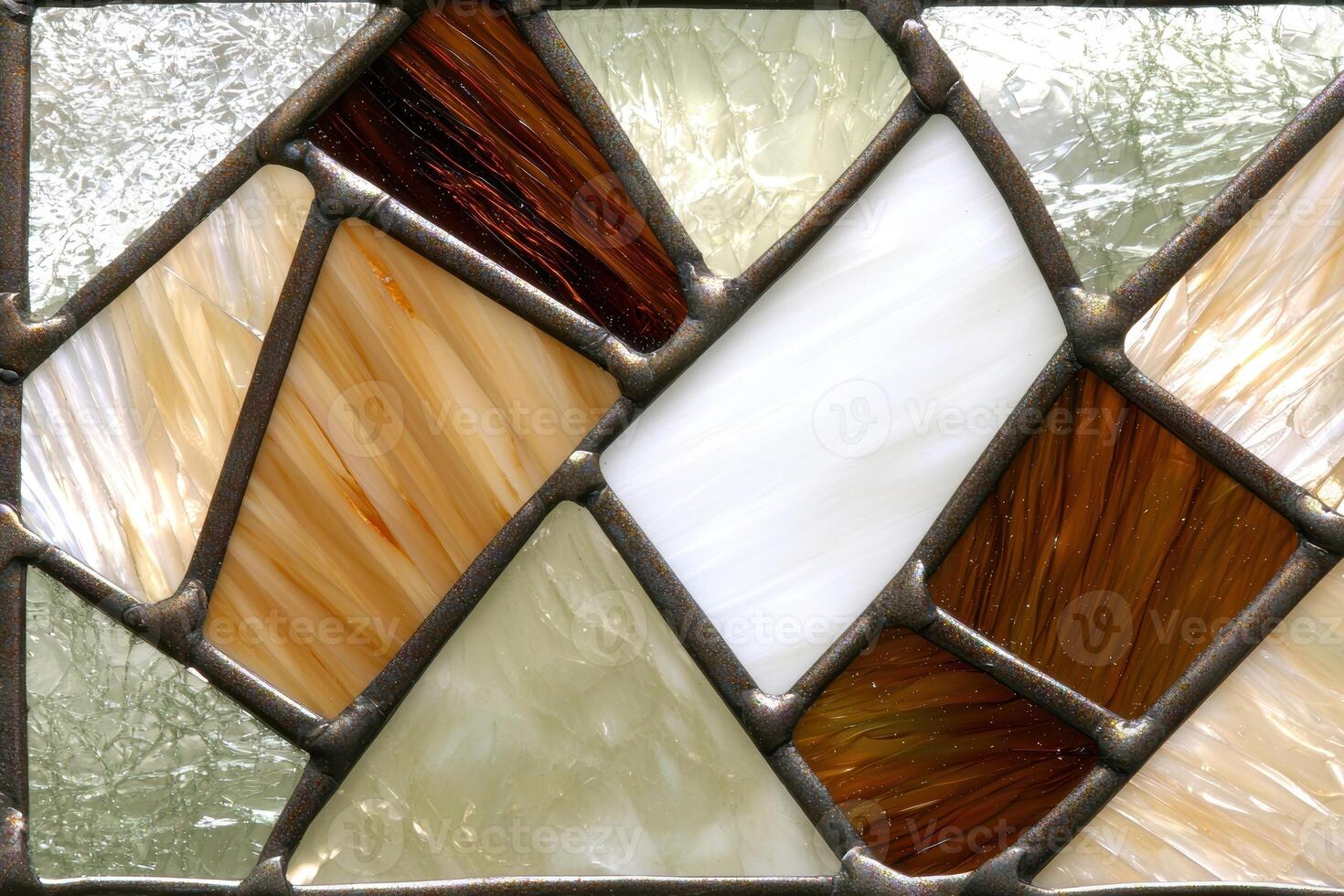 Abstract geometric stained glass window with brown and beige patterns photo