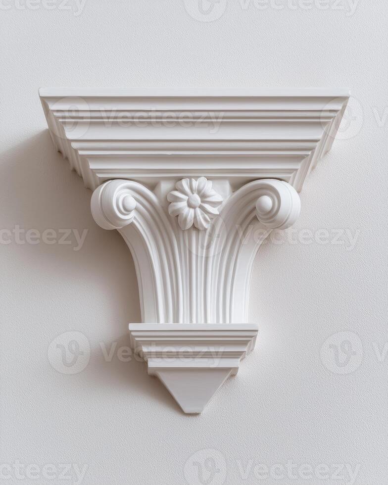 White ornate wall shelf with classical design photo
