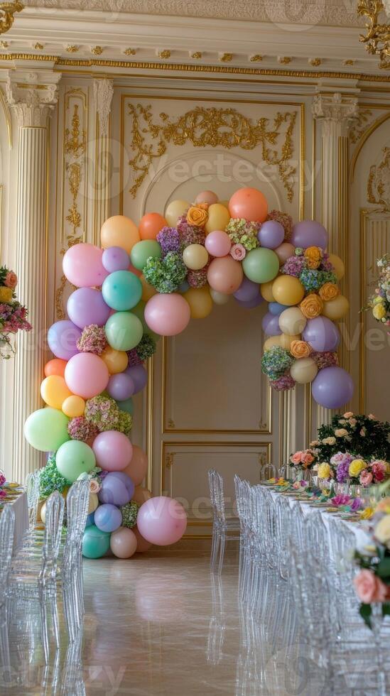 Elegant pastel balloon arch in a luxurious venue setting for a festive occasion. photo