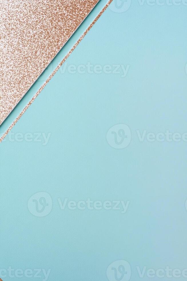 Elegant abstract design with glittering gold and light blue geometric shapes. photo