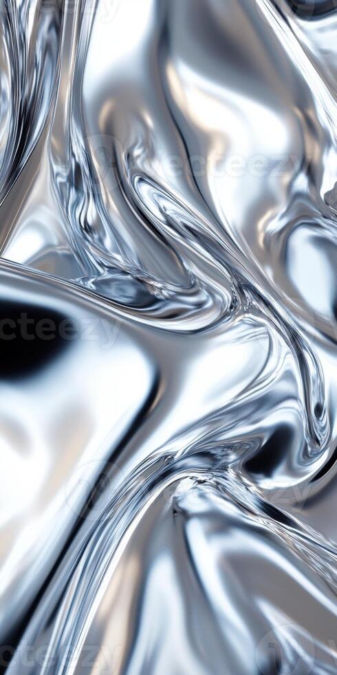 Abstract wavy metallic surface reflecting light in a fluid motion. photo