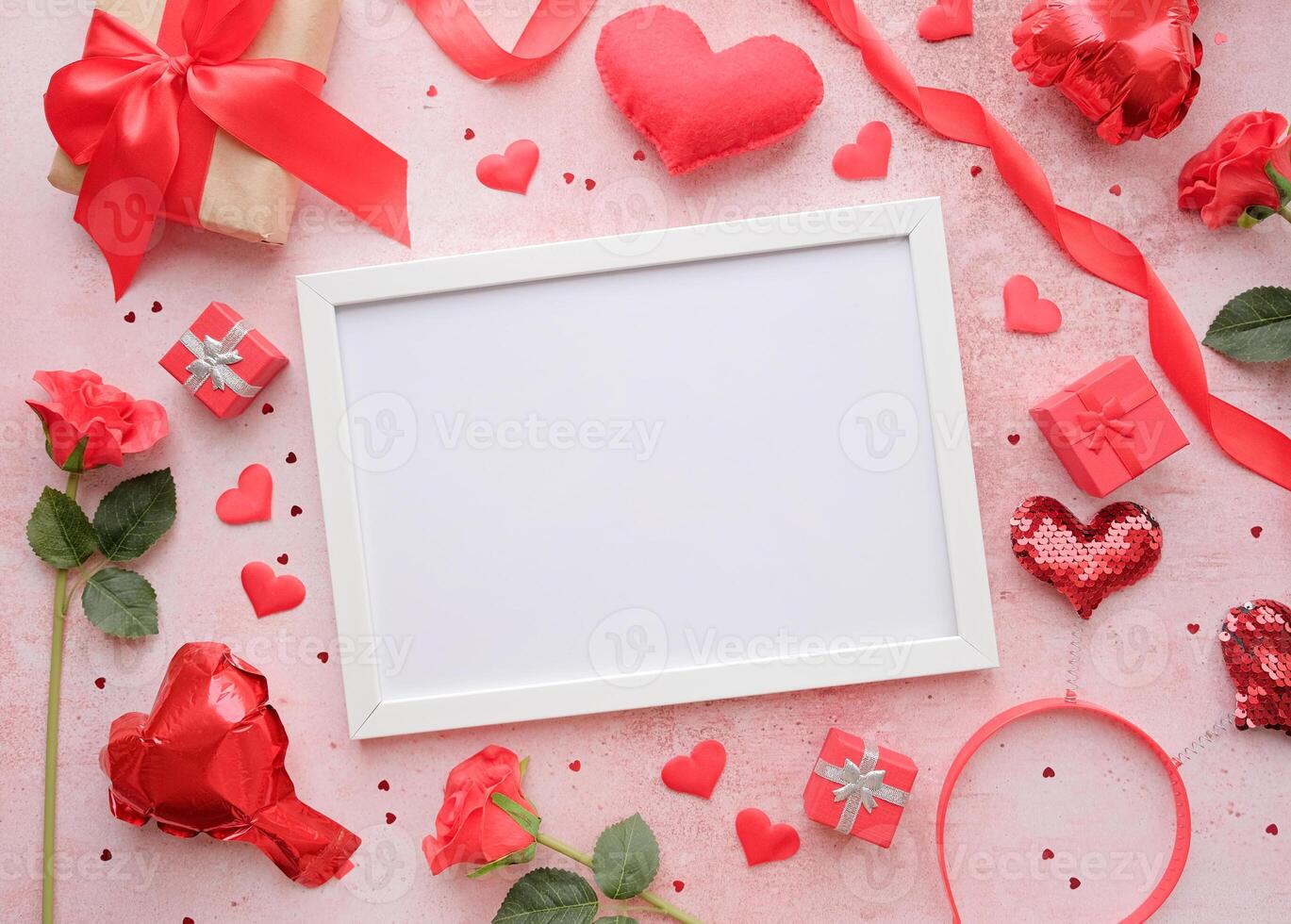 valentines day background. beautiful decorations and white frame on pink with copy space photo