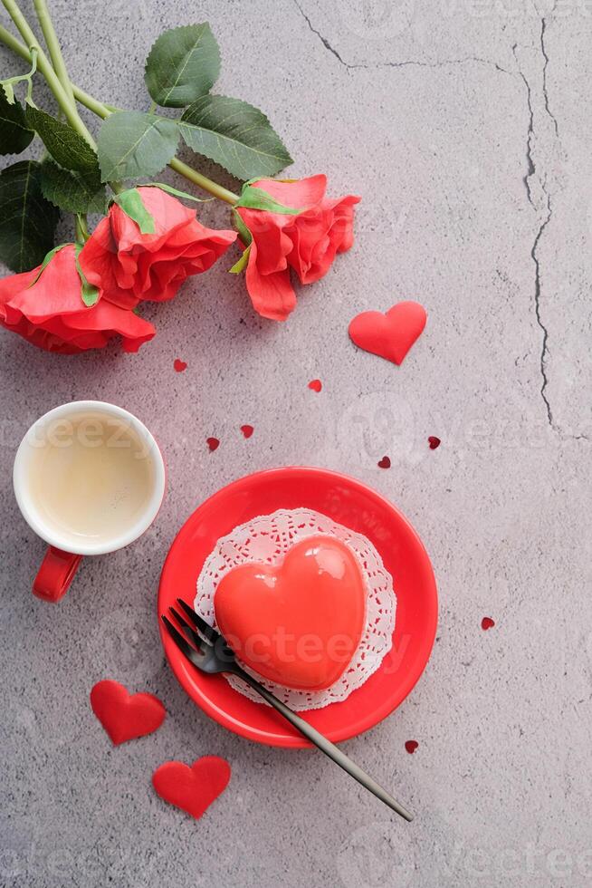 red heart cake and an espresso in small cup for valentines day , copy space photo