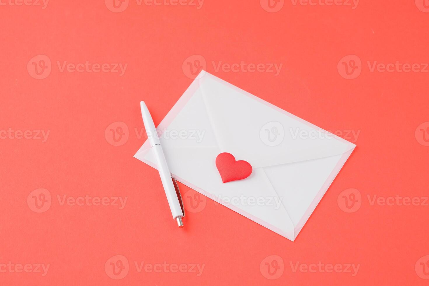 valentines day envelope on red background photo