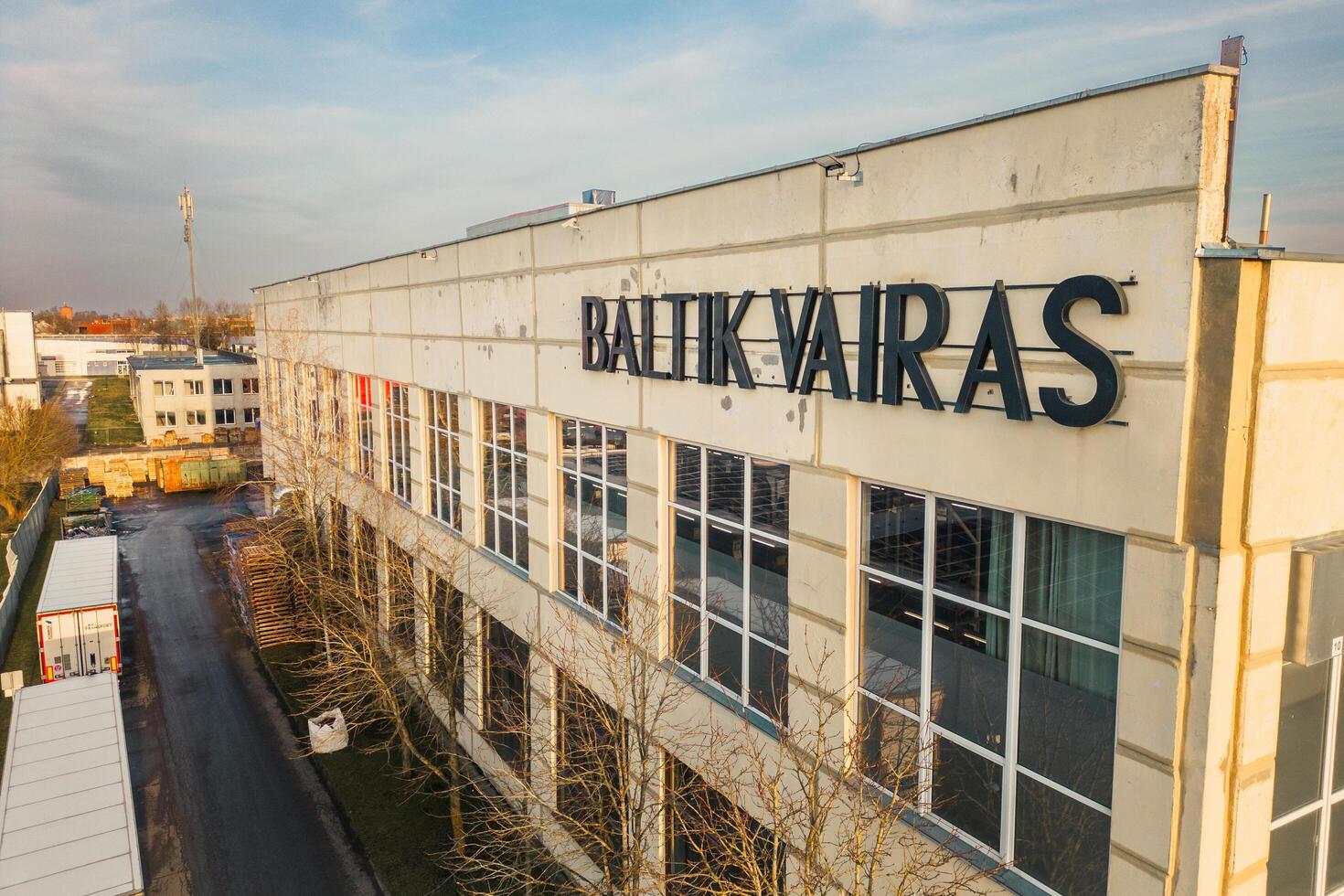 Siauliai, Lithuania - 15th november, 2024- aerial view Baltik vairas sign - full-service largest OEM bike manufacturer building facilities in Northern Europe. Electric bike assembly point photo