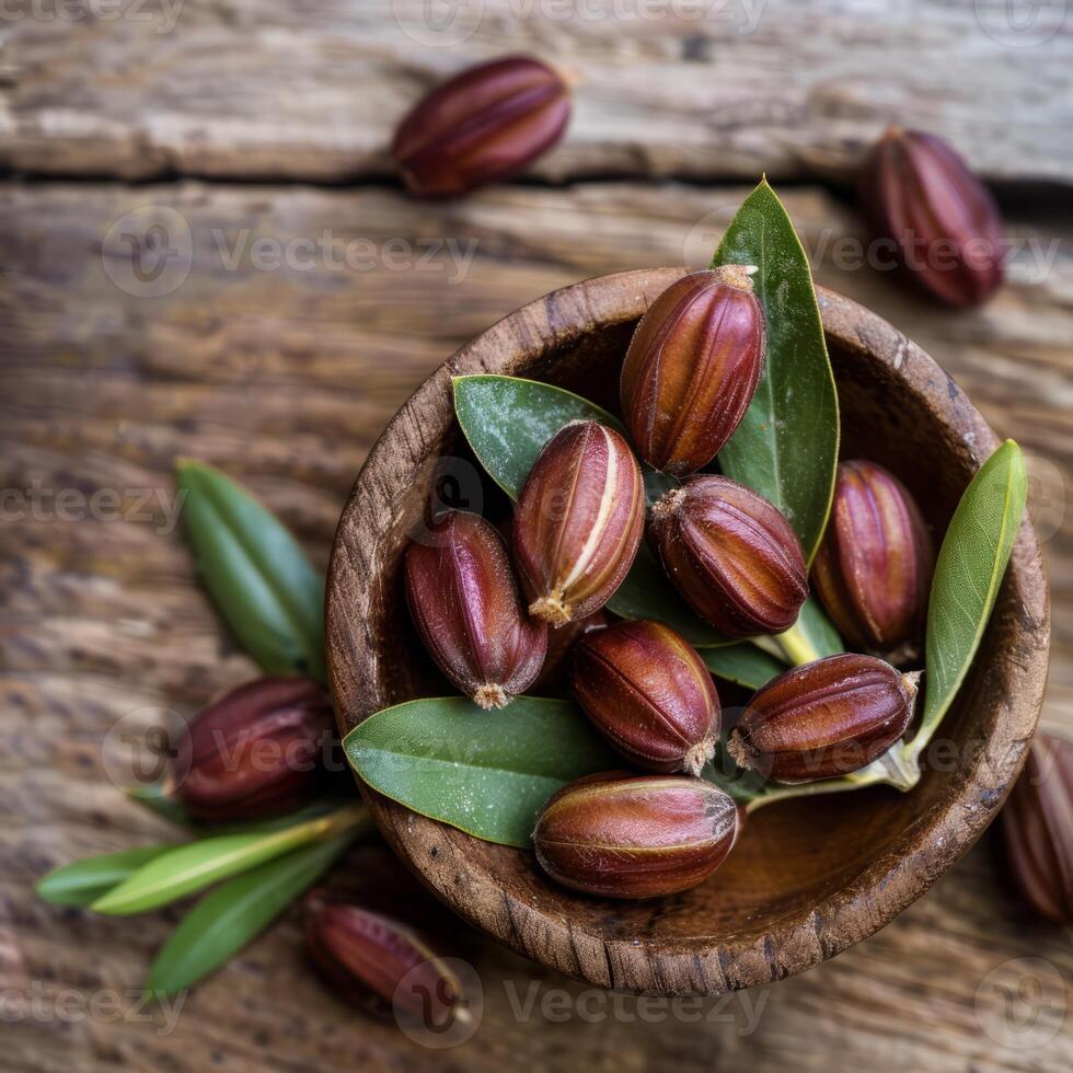Jojoba seeds in the bowl, healthy food photo, eco photo