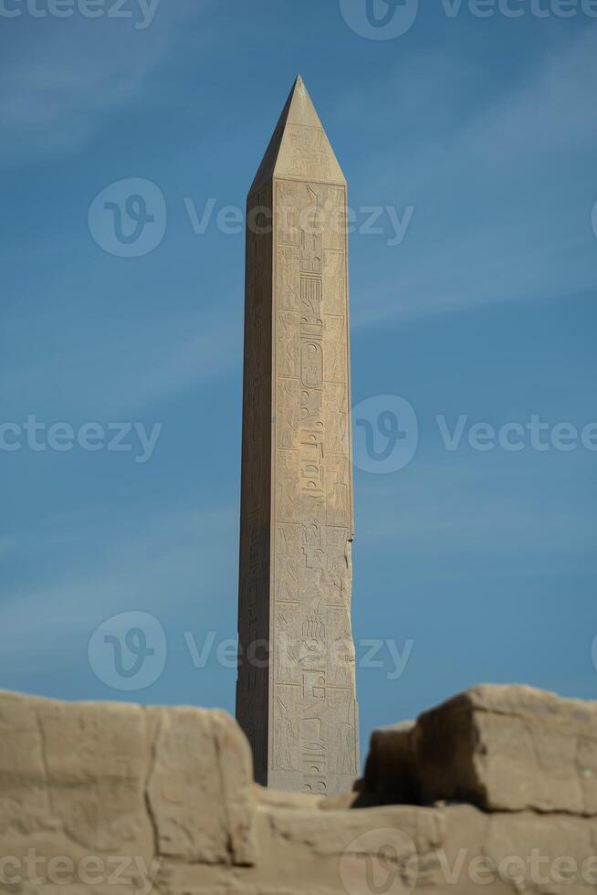 Egyptian Ancient Obelisk Outside the Ruined Walls at Karnak photo