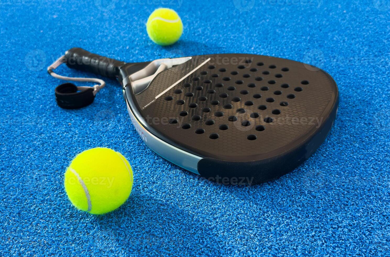 yellow tennis ball or paddle tennis and white lines on blue court. Horizontal sport poster, greeting cards, headers, website photo