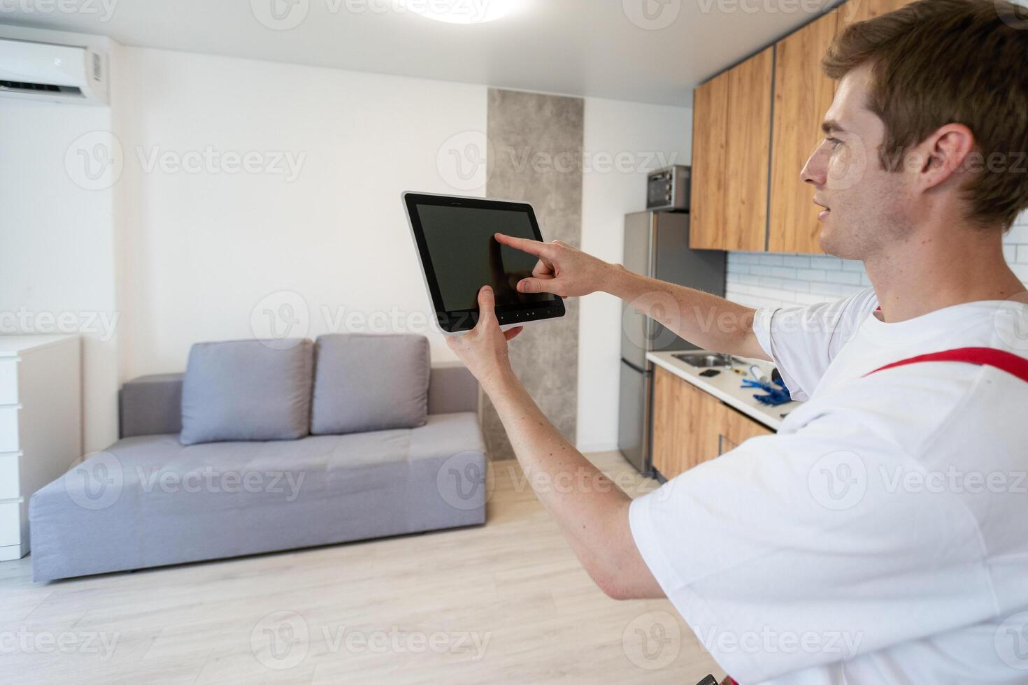 Smart home technology, wall system and man with digital ui monitor for thermostat heating, safety security network or air conditioning. AI software app, house automation or profile of person with IOT. photo