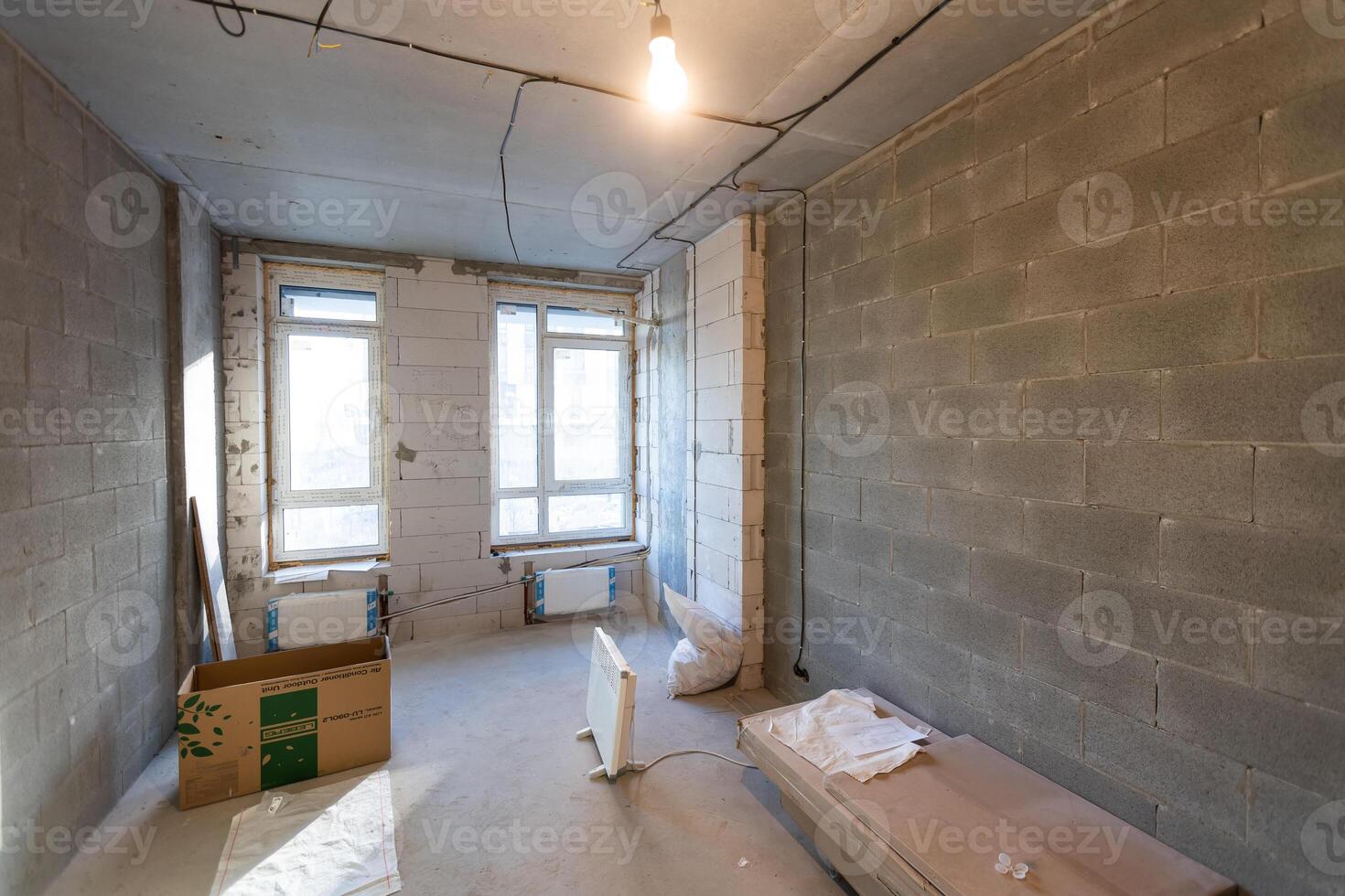 Working process of installing metal frames for plasterboard -drywall - for making gypsum walls in apartment is under construction, remodeling, renovation, extension, restoration and reconstruction photo