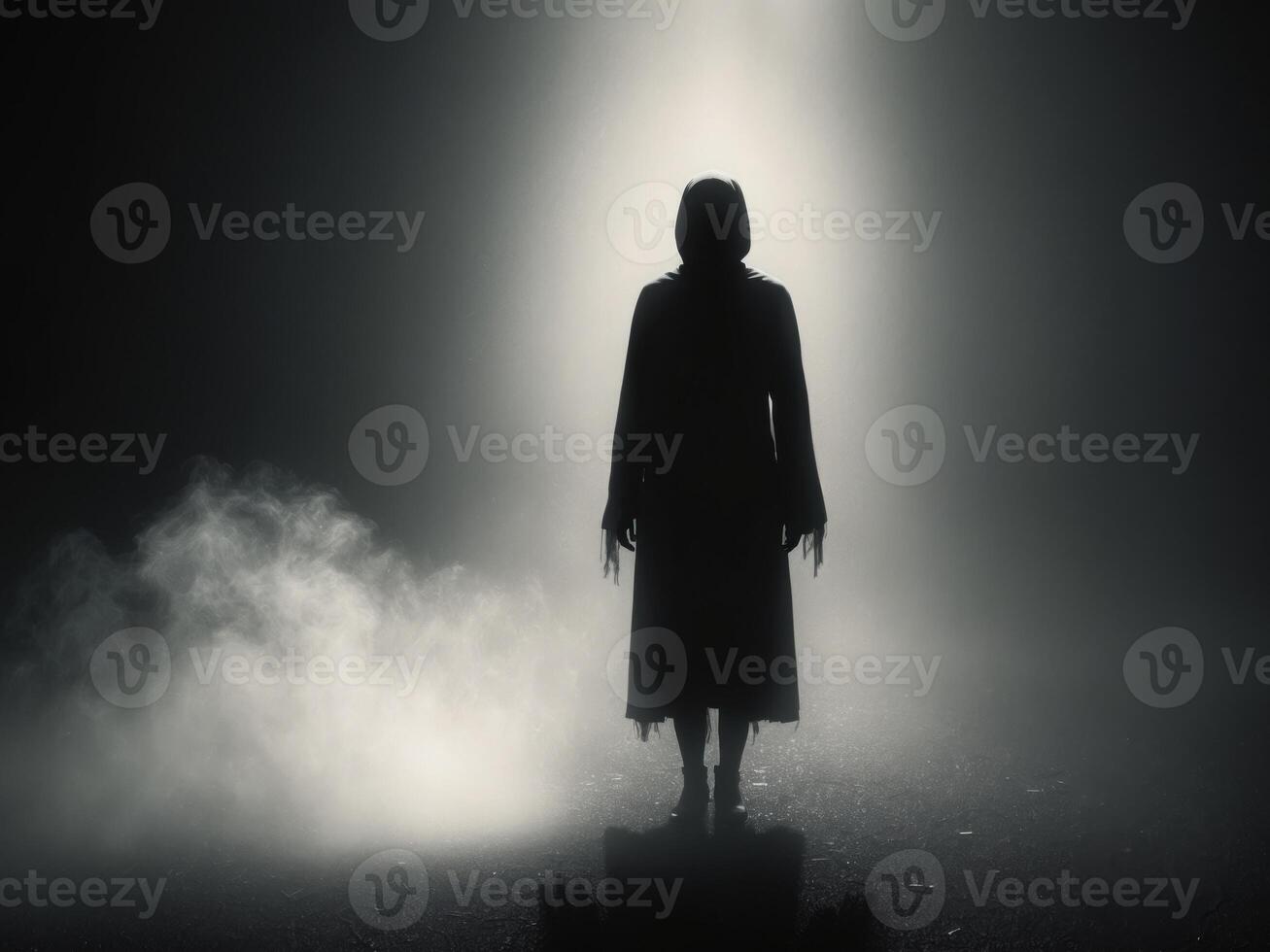 Dark and Haunting Figure in Mysterious Atmosphere.Dark and Haunting Figure in Mysterious Atmosphere. photo