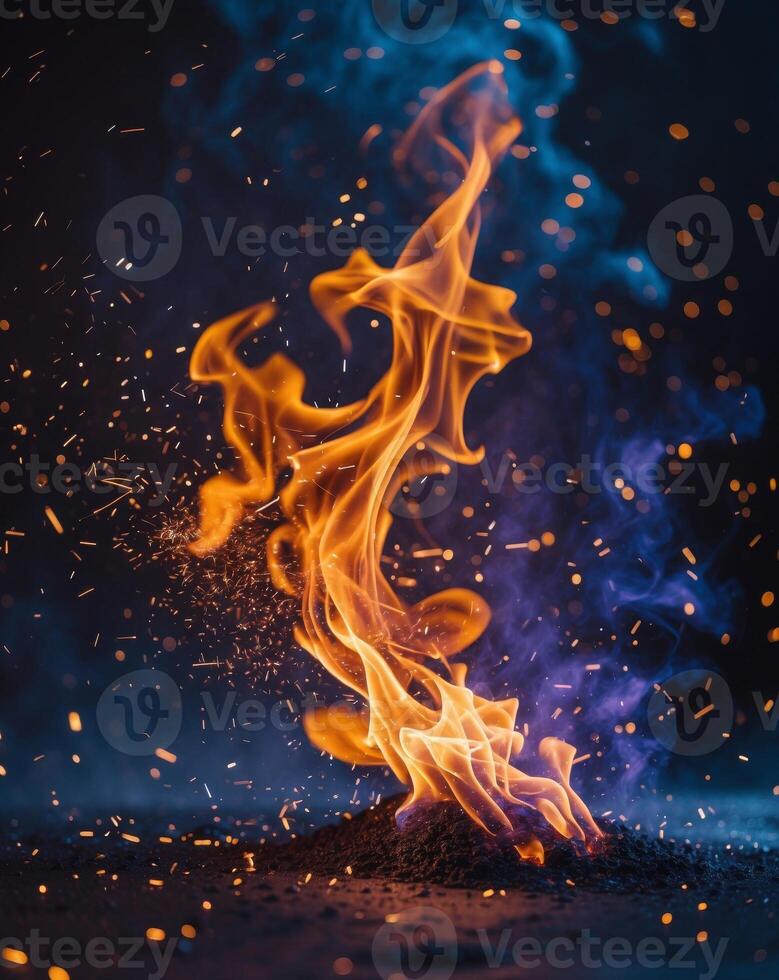 Vibrant Flames and Sparks Create a Dynamic Atmosphere in Dark SurroundingsVibrant Flames and Sparks Create a Dynamic Atmosphere in Dark Surroundings. photo