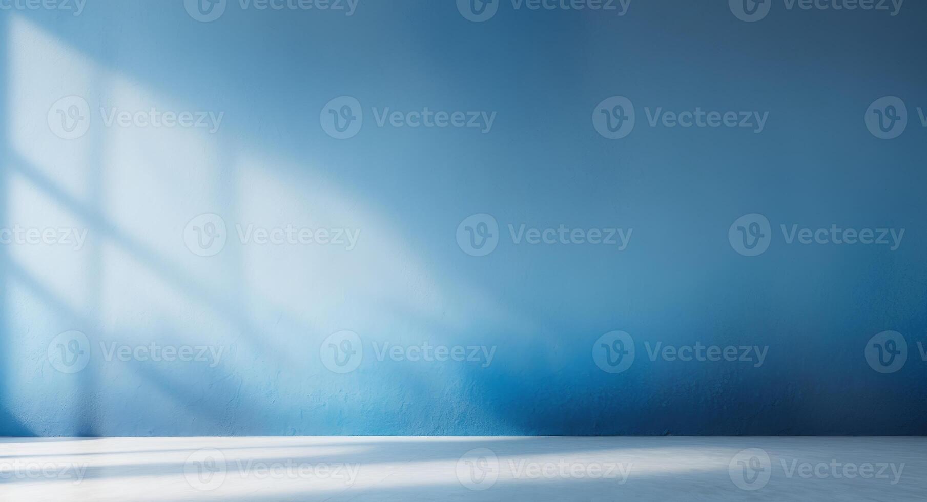 A captivating blue gradient abstract studio wall backgroundA captivating blue gradient abstract studio wall background. photo