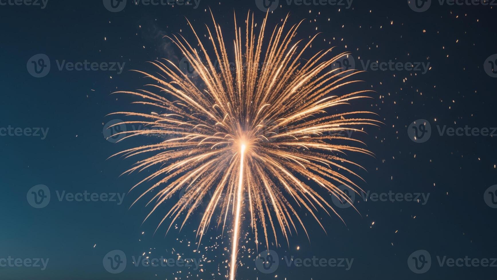 Golden firework exploding in the night sky.Golden firework exploding in the night sky. photo