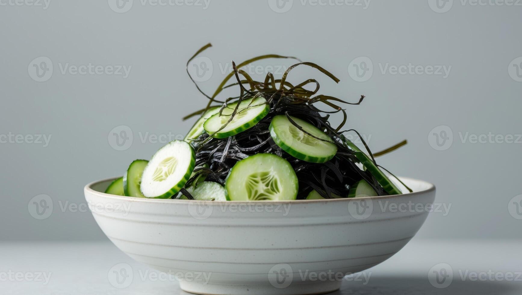 Refreshing Cucumber and Seaweed Salad in a BowlRefreshing Cucumber and Seaweed Salad in a Bowl. photo