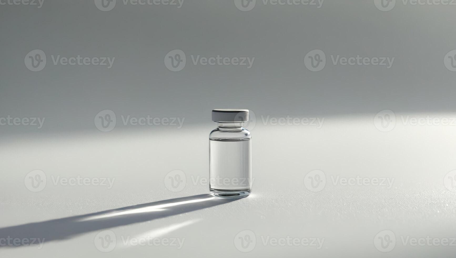 Single Medicine Vial on a White Surface in Bright LightSingle Medicine Vial on a White Surface in Bright Light. photo