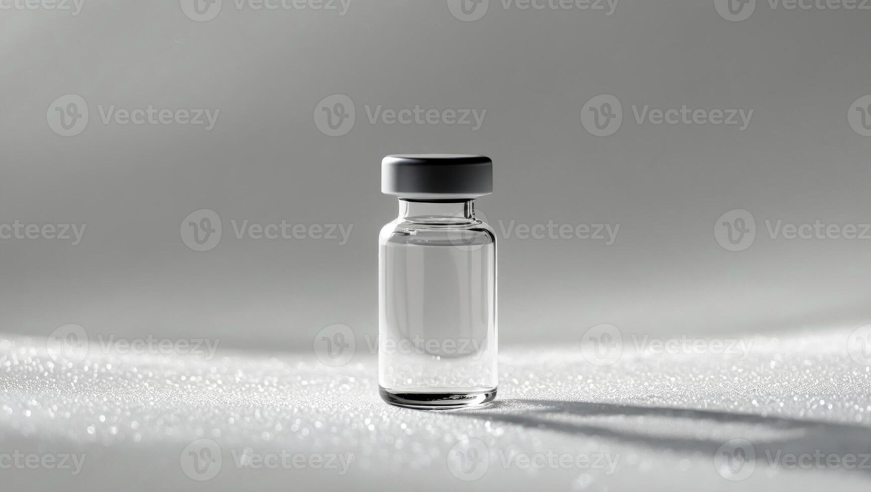 Single Medicine Vial on a White Surface in Bright Light photo