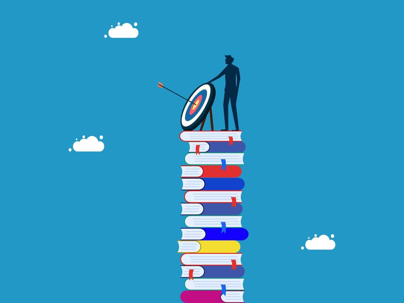 businessman on top of books with target on top vector