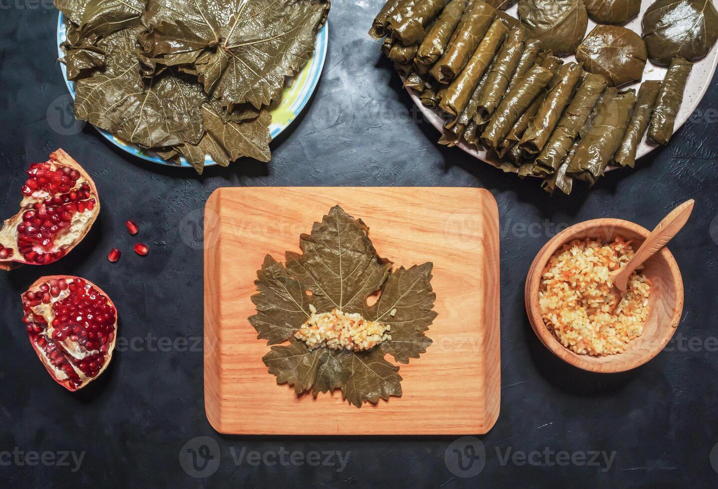 Stuffed Grape Leaves. Preparation of Dolma from grape leaves photo