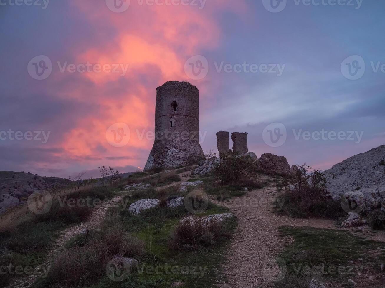 Twilight with a view of the ruins of the fortress photo
