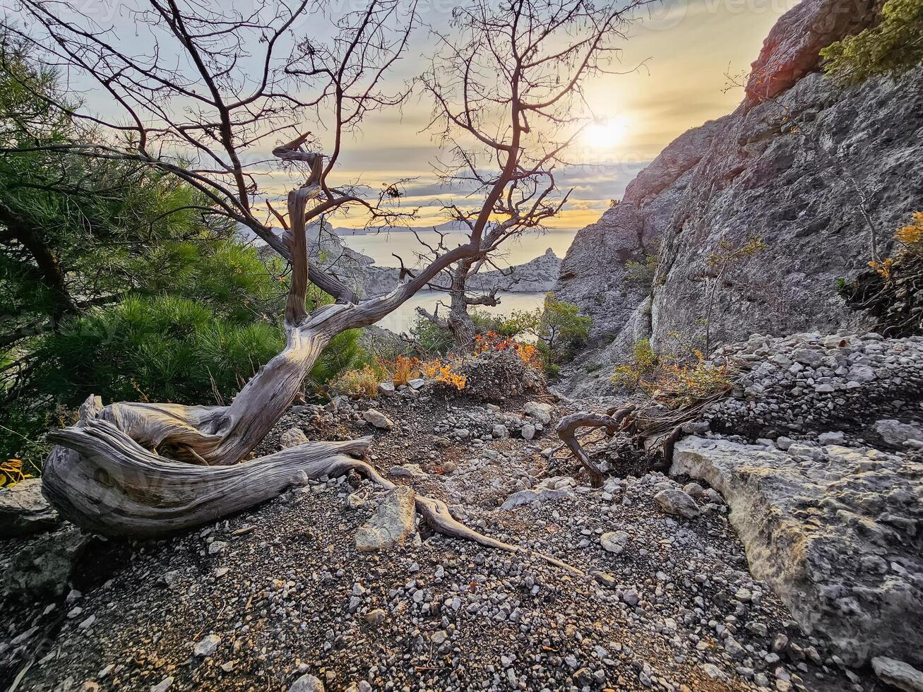 Dangerous off road driving along mountain edge and steep cliffs. photo