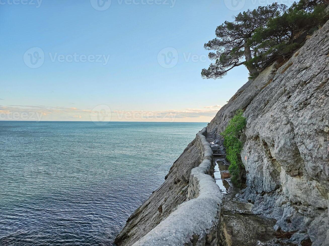 stone trail along the edge of the cliff in Crimea. photo