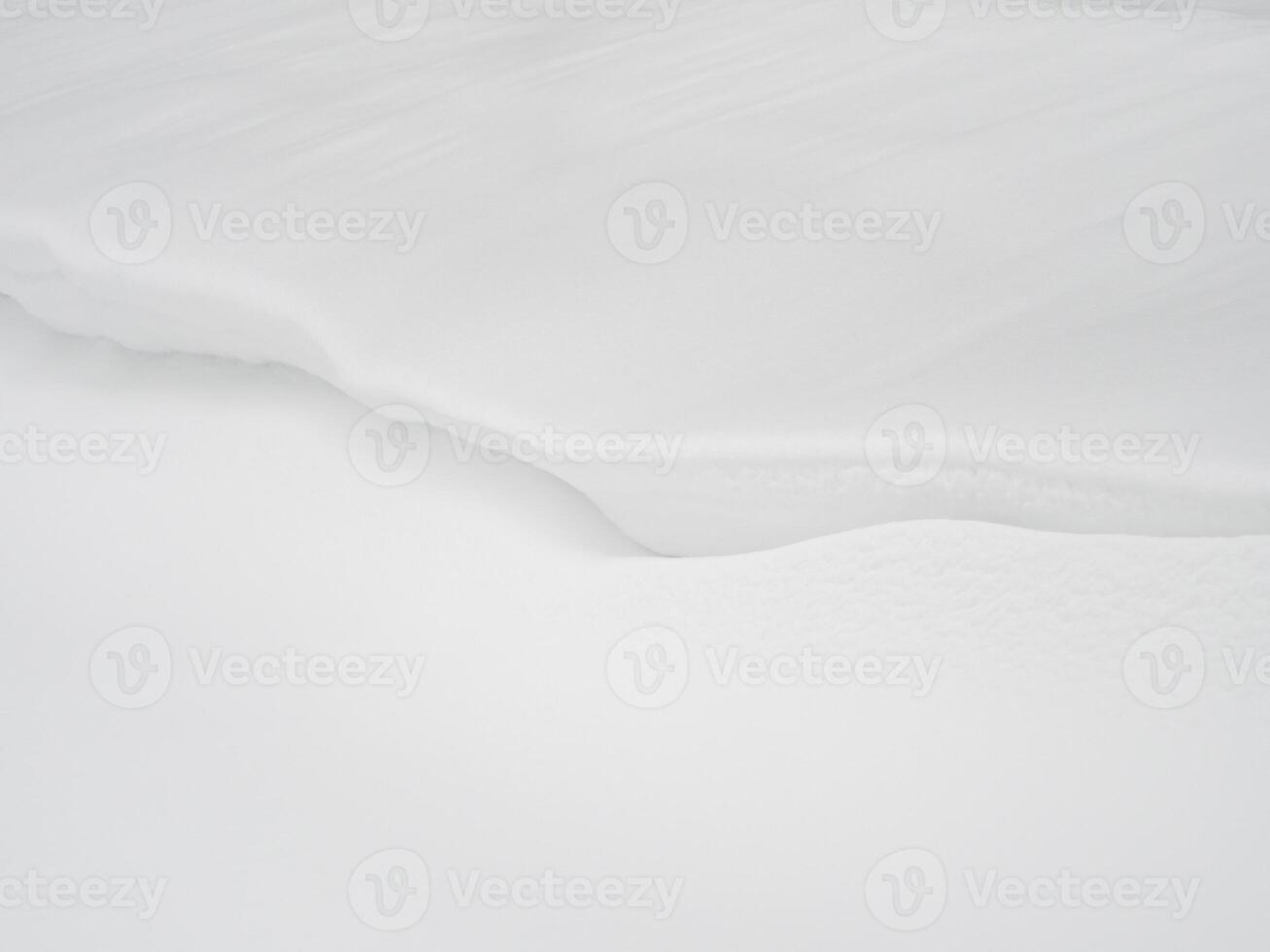 Snow drifts background, a large amount of fallen snow. White clean snow texture. photo