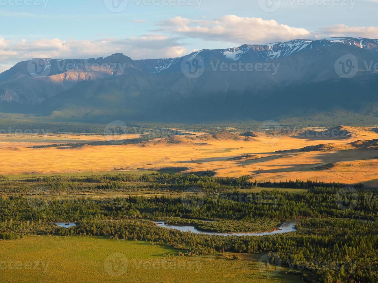 Autumn landscape in clear weather with winding river. Warm sunlight and open space, freedom. photo
