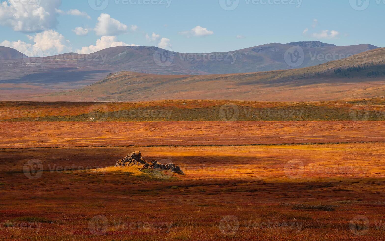 Panoramic shadow view of sunny colorful mountain landscape with a prairie photo