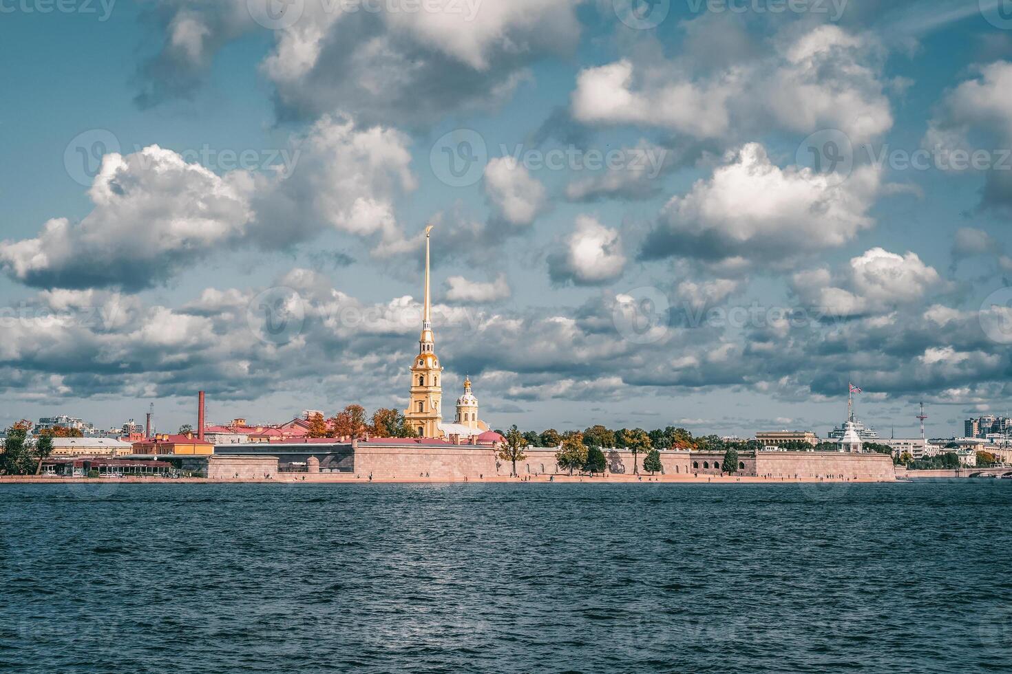 Beautiful autumn view of the Peter and Paul fortress from the Neva river in Saint Petersburg photo