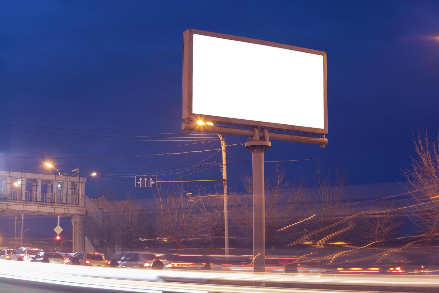 Billboard in the street at night photo