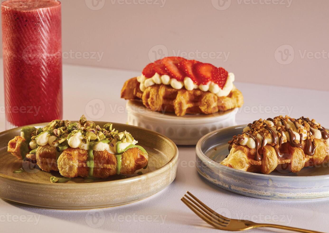 amiran a table topped with plates of food and drinks photo